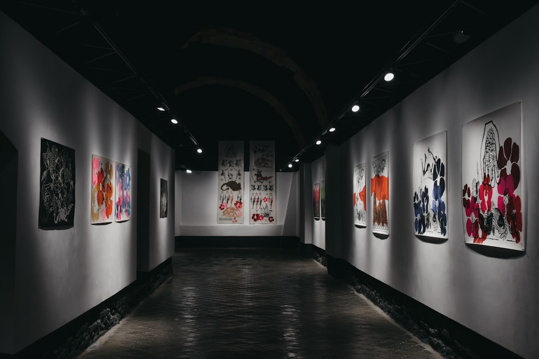 empty-hallway-with-paintings-on-the-wall-ucnagwn4efu